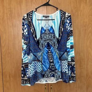 Metric XL long sleeve shirt. Blue, white and yellow print. V-Neck. Viscose/nylon